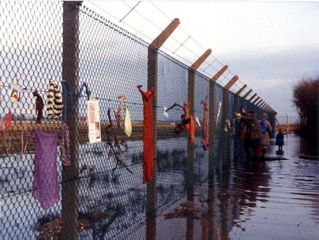 Photograph of the decoration of Greenham Common Women's Peace Camp fence