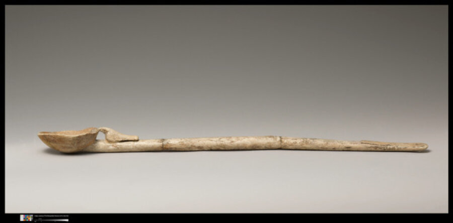 Ancient Egyptian spoon with a falcon on the handle